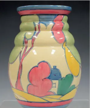  ?? ?? A Clarice Cliff Fantasque Pastel Autumn pattern vase, shape No. 358, circa 1930.