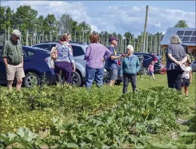  ?? MEDIANEWS GROUP— CARLY STONE ?? Visitors got a tour of Salt City Harvest Farm Saturday as a part of Madison County’s Open Farm Day