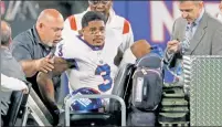  ?? Corey Sipkin ?? TOUGH FINISH: Sterling Shepard’s face says it all as he gets on a cart after tearing his ACL.