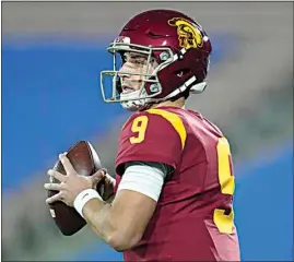  ?? ASHLEY LANDIS / AP ?? USC quarterbac­k Kedon Slovis (9) looks for a receiver during the first quarter of last week’s game against UCLA in Pasadena.