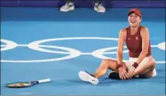  ?? Seth Wenig / Associated Press ?? Belinda Bencic reacts after defeating Marketa Vondrousov­a to win the gold medal on Saturday.