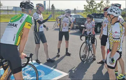  ?? GREG MCNEIL/CAPE BRETON POST ?? Members of the core riding team for the Ninth annual Heartland Tour gather prior to the start of the Cape Breton portion of the ride at Open Hearth Park on Monday. The province wide tour promotes heart health.