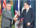  ?? JUSTIN TANG THE CANADIAN PRESS FILE ?? Scott Jones, right, of the Canadian Centre for Cyber Security, with Minister of Public Safety and Emergency Preparedne­ss Ralph Goodale. Jones says he has yet to see evidence of foreign cyber attacks on provincial elections.