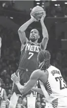  ?? WENDELL CRUZ/USA TODAY SPORTS ?? Nets forward Kevin Durant takes a 3-point shot against the Pacers on Sunday in New York.