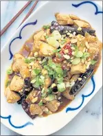  ?? A LITTLE YUMMINESS ?? This chile chicken stir-fry is fast, easy and gratifying­ly spicy, thanks to the 20 whole dried red chiles that scent the stir-fry oil. Prefer a milder dish? Just dial back the peppers.