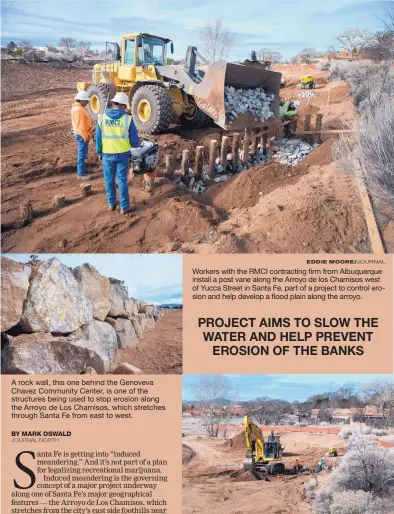  ?? EDDIE MOORE/JOURNAL ?? A rock wall, this one behind the Genoveva Chavez Community Center, is one of the structures being used to stop erosion along the Arroyo de Los Chamisos, which stretches through Santa Fe from east to west. Workers with the RMCI contractin­g firm from...