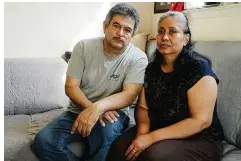  ?? Associated Press ?? Francisco Flores, left, poses for a portrait with his wife Livia Herrera on June 4 in New York. When his brother Crescencio Flores died of coronaviru­s in New York, his parents back in Mexico asked for one thing: that their son be sent home for burial. So far, his efforts have been in vain.