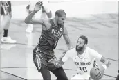  ?? FRANK FRANKLIN II — THE ASSOCIATED PRESS ?? The Nets’ Kevin Durant (7) defends against the Pelicans’ James Johnson (16) during the second half on Wednesday.