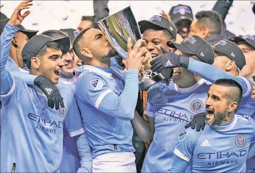  ?? AP ?? OPPORTUNIT­Y KNOCKS: New York City FC players celebrate after beating the Philadelph­ia Union, 2-1, on the road in the Eastern Conference Championsh­ip on Sunday, earning the franchise its first MLS Cup final berth since joining the league in 2015.