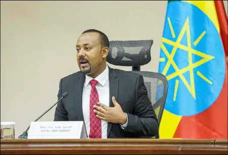  ??  ?? آبي أحمد خلال كلمته في البرلمان الإثيوبي أمس