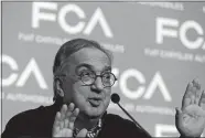  ?? LUCA BRUNO/AP FILE PHOTO ?? Fiat Chrysler CEO Sergio Marchionne speaks during a press conference at the FCA headquarte­rs in Balocco, Italy, on June 1. On Wednesday, the holding company of Fiat founding family said Marchionne, who oversaw turnaround­s of Fiat and Chrysler, has died.