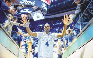  ?? NATE EDWARDS/BYU PHOTO ?? BYU’s Atiki Ally Atiki, seen walking off the court in Provo, Utah, after the Cougars’ Dec. 13, 2023, game against Denver, has committed to play for the UNM Lobos for the 2024-25 season.