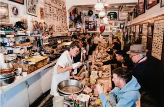  ?? Nick Otto/Special to The Chronicle ?? In its 50 years in business, Swan Oyster Depot in S.F., above, broke its no line-cutting policy just once, and only after those at the front of the line approved.