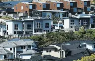  ?? HAGEN HOPKINS / GETTY IMAGES FILES ?? A controvers­ial law in New Zealand bans non-resident foreigners from buying a home.