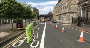  ??  ?? Work on the new cycle lane on the Broomielaw