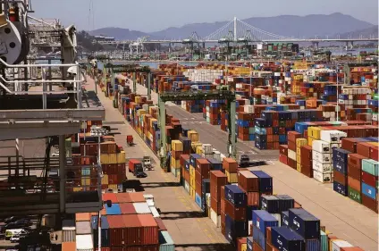  ?? Paul Kuroda / Special to The Chronicle ?? Shipping containers at the Port of Oakland in April 2021. The port has experience­d an increase in imports.