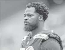  ?? Otto Greule Jr / Getty Images ?? Seahawks defensive lineman Michael Bennett became emotional while talking about his three daughters and describing his experience with the Las Vegas Metropolit­an Police Department.