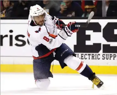  ?? ASSOCIATED PRESS FILE PHOTO ?? Washington Capitals left-winger Alex Ovechkin is leading the National Hockey League with 26 goals at the halfway point of the season and on pace for the eighth 50-goal campaign of his 13-year career