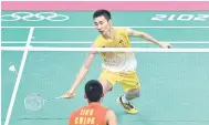  ?? — Gambar AFP ?? LEGENDA NEGARA: Chong Wei jersi kuning.