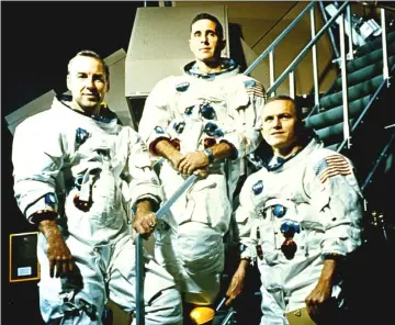  ??  ?? The Apollo 8 crew, from left, Jim Lovell, Bill Anders and Frank Borman. — NASA photos