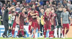  ?? REUTERS ?? Thai players react after playing out a draw with the UAE in the Asian Cup.