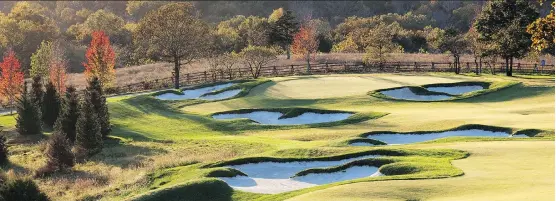  ?? ANDREW PENNER ?? You’re not likely to forget a trip to play the stunning par-4 12th on the Tom Fazio-designed Buffalo Ridge Springs course at Big Cedar Lodge in Branson, Mo.
