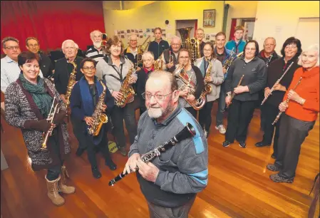  ?? Picture: SAM ROSEWARNE ?? IN TUNE: Neil Turnbull, front, and members of the Clarence City Band transition band.