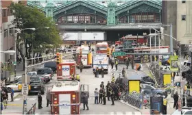  ?? Bryan Thomas / New York Times ?? First responders outside the station in Hoboken, N.J., where a commuter train crash Thursday killed one person and injured more than 100 others.