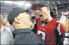  ?? KEVIN C. COX / GETTY IMAGES ?? Super Bowl-bound Falcons coach Dan Quinn and quarterbac­k Matt Ryan celebrate after defeating the Packers in the Georgia Dome on Sunday.