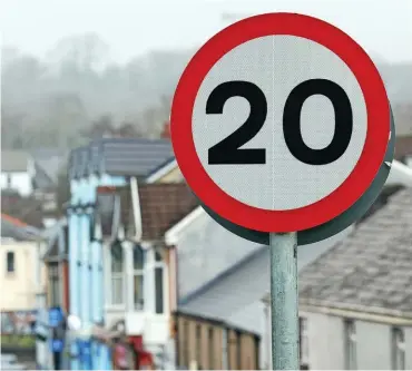  ?? ROB BROWNE ?? A 20mph sign in Aberkenfig, Bridgend. New Transport Secretary Ken Skates says the Welsh Government will make changes to the current guidance on the speed limit