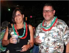  ?? NWA Democrat-Gazette/CARIN SCHOPPMEYE­R ?? Kathy Taylor and Marty Spaeth visit at the luau July 12 in Fayettevil­le.