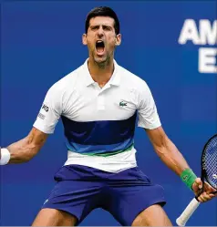  ?? JOHN MINCHILLO/ASSOCIATED PRESS ?? Novak Djokovic reacts after scoring a point in his 6-7 (4), 6-3, 6-3, 6-2 win against Kei Nishikori during the third round of the U.S. Open on Saturday in New York.