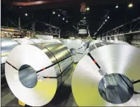  ?? CP PHOTO ?? Rolls of coiled coated steel are shown June 29 at Stelco in Hamilton, Ont.