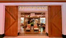  ??  ?? Pottery Barn’s chic furniture is great for cozy spaces.