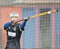  ??  ?? Young Oban Camanachd goalkeeper Cameron Sutherland makes a good save.