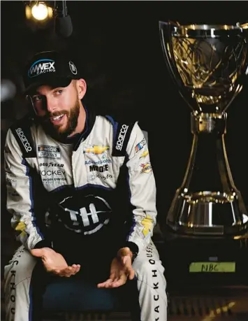  ?? SEAN GARDNER/GETTY ?? Ross Chastain speaks to the media on Thursday during the NASCAR Championsh­ip 4 Media Day at Phoenix Raceway in Avondale, Arizona.