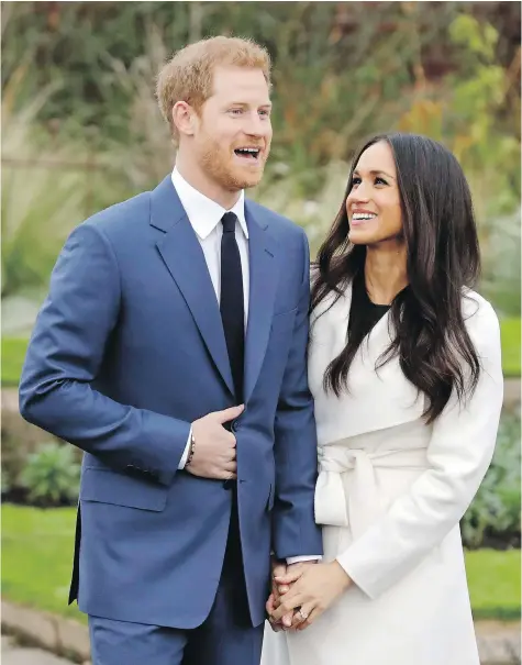  ??  ?? Prince Harry and his fiancée Meghan Markle on the grounds of London’s Kensington Palace after their engagement was announced.