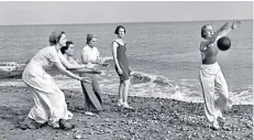  ??  ?? Heil school: Judi Dench in Six Minutes to Midnight, left; pupils on the beach at Bexhill, above; the school badge, below