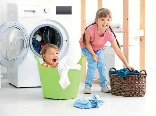  ??  ?? Separating your laundry is one of the best ways to prolong the life of your clothes – even the kids can get in on the act.