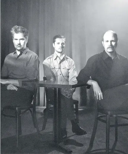  ?? BONSOUND ?? Timber Timbre’s Sincerely, Future Pollution is coloured by of old-school synthesize­rs, in contrast to the sparse, folky sound of the group’s early days. But “the songs have been generated from the same place,” says Mathieu Charbonnea­u, centre, with...