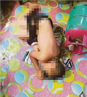  ?? PIC COURTESY OF POLICE ?? The boy who was chained to a gas cylinder by his stepfather in Indera Mahkota on Thursday.