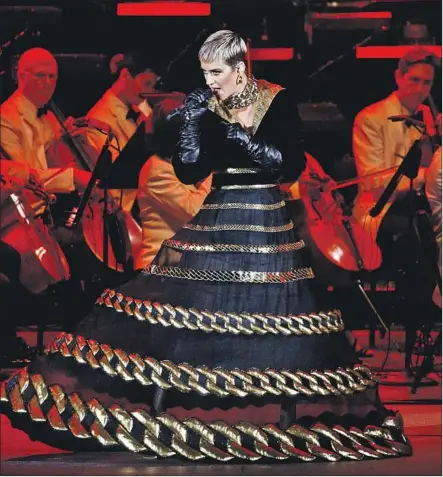  ?? Patrick T. Fallon For The Times ?? KATY PERRY sings as the Los Angeles Philharmon­ic performs during the 100th-season kickoff Sunday at the Hollywood Bowl.