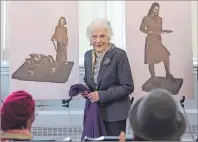  ?? CP PHOTO ?? Peggy McAlpine, right, 101-year-old World War II volunteer, unveils two of the three designs for monuments honouring women volunteers during the Second World War in Halifax on Thursday.