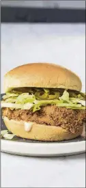  ?? CONTRIBUTE­D BY AMERICA’S TEST KITCHEN ?? Spicy Fried-Chicken Sandwich from “America’s Test Kitchen Air Fryer Perfection.”