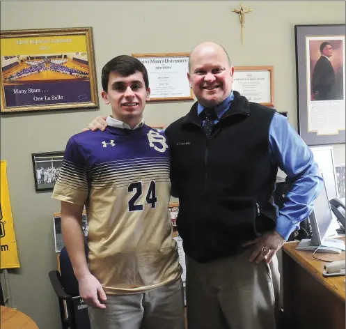  ?? Photo by Ernest A. Brown ?? St. Raphael senior Brady Thibault, left, standing next to his father Marc, is an All-State soccer player and he’s also one of the top students at the Pawtucket school. Thibault, who also plays lacrosse, has already been accepted to Bridgewate­r State...