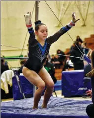  ?? COURTESY PHOTO/AMANDA HENDRICKSO­N ?? Lodi resident Makenzie Templeman completes a landing during a recent competitio­n.