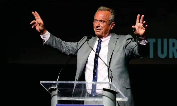  ?? Photograph: Charlie Neibergall/AP ?? Robert F Kennedy Jr waves to supporters during a campaign event on Saturday in West Des Moines, Iowa.