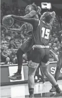  ?? JOSH GALEMORE/ARIZONA DAILY STAR ?? Arizona guard Aari McDonald heads toward the basket as UC Santa Barbara guard Tal Sahar tries to cut her off during the Wildcats’ win at McKale Center on Saturday. McDonald led all scorers with 21 points. She also had seven rebounds, seven assists and one steal.