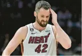  ?? MATT KELLEY/AP ?? Heat’s Kevin Love, pictured, starting in place of Caleb Martin has not provided answers for Erik Spoelstra, just more questions.
