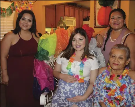  ?? The Cota family at a Hawaian summer party. PHOTO COURTESY OF J. PADILLA ??